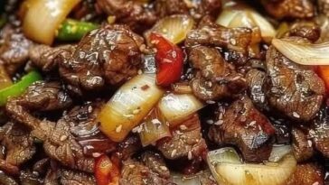 Sizzling Chinese pepper steak with onions